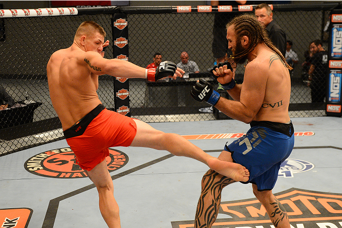 LAS VEGAS, NV - OCTOBER 16: (L-R) Anton Berzin kicks Cody Mumma in their elimination fight during filming of season nineteen of The Ultimate Fighter on October 16, 2013 in Las Vegas, Nevada. (Photo by Al Powers/Zuffa LLC/Zuffa LLC via Getty Images) *** L