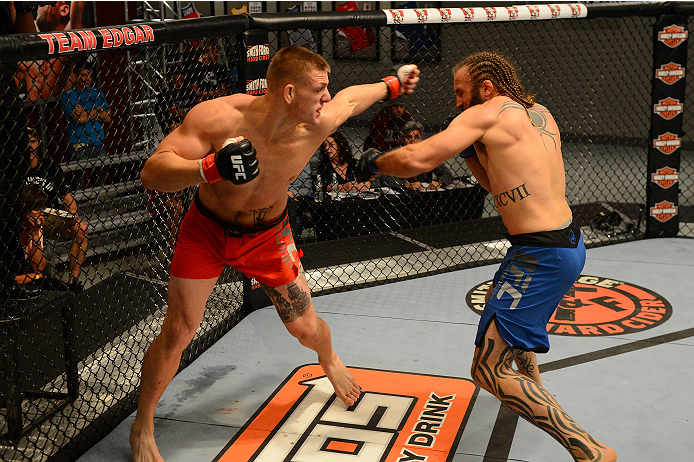 LAS VEGAS, NV - OCTOBER 16: (L-R) Anton Berzin punches Cody Mumma in their elimination fight during filming of season nineteen of The Ultimate Fighter on October 16, 2013 in Las Vegas, Nevada. (Photo by Al Powers/Zuffa LLC/Zuffa LLC via Getty Images) ***