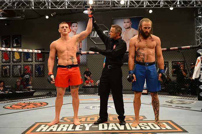 LAS VEGAS, NV - OCTOBER 16: (L-R) Anton Berzin celebrates after submitting Cody Mumma in their elimination fight during filming of season nineteen of The Ultimate Fighter on October 16, 2013 in Las Vegas, Nevada. (Photo by Al Powers/Zuffa LLC/Zuffa LLC v