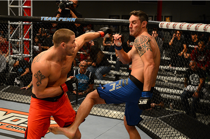LAS VEGAS, NV - OCTOBER 16: (L-R) Josh Stansbury punches Chris Fields in their elimination fight during filming of season nineteen of The Ultimate Fighter on October 16, 2013 in Las Vegas, Nevada. (Photo by Al Powers/Zuffa LLC/Zuffa LLC via Getty Images)