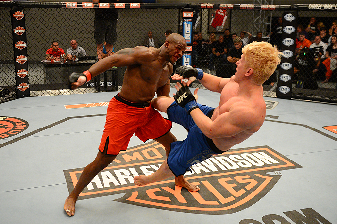LAS VEGAS, NV - OCTOBER 16: (L-R) Eddie Gordon punches Matt Gabel in their elimination fight during filming of season nineteen of The Ultimate Fighter on October 16, 2013 in Las Vegas, Nevada. (Photo by Al Powers/Zuffa LLC/Zuffa LLC via Getty Images) ***