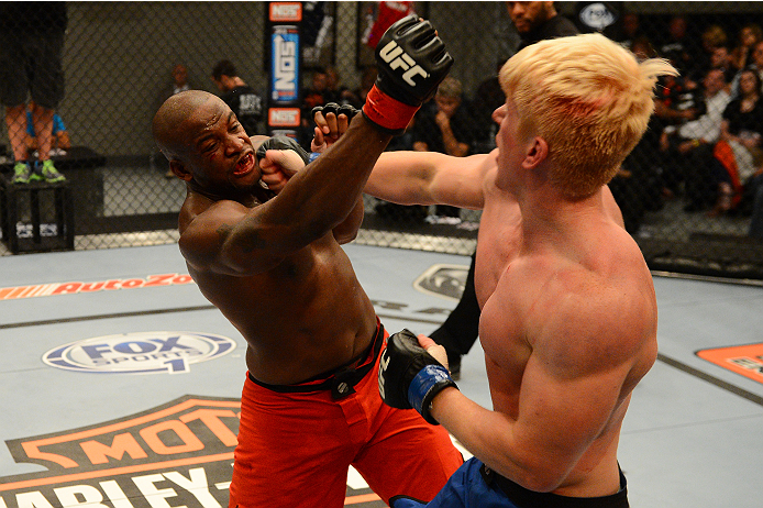 LAS VEGAS, NV - OCTOBER 16: (L-R) Eddie Gordon punches Matt Gabel in their elimination fight during filming of season nineteen of The Ultimate Fighter on October 16, 2013 in Las Vegas, Nevada. (Photo by Al Powers/Zuffa LLC/Zuffa LLC via Getty Images) ***