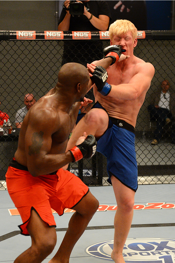 LAS VEGAS, NV - OCTOBER 16: (L-R) Eddie Gordon punches Matt Gabel in their elimination fight during filming of season nineteen of The Ultimate Fighter on October 16, 2013 in Las Vegas, Nevada. (Photo by Al Powers/Zuffa LLC/Zuffa LLC via Getty Images) ***