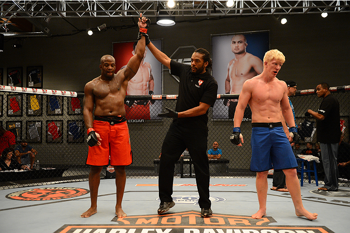 LAS VEGAS, NV - OCTOBER 16: (L-R) Eddie Gordon celebrates after defeating Matt Gabel in their elimination fight during filming of season nineteen of The Ultimate Fighter on October 16, 2013 in Las Vegas, Nevada. (Photo by Al Powers/Zuffa LLC/Zuffa LLC vi