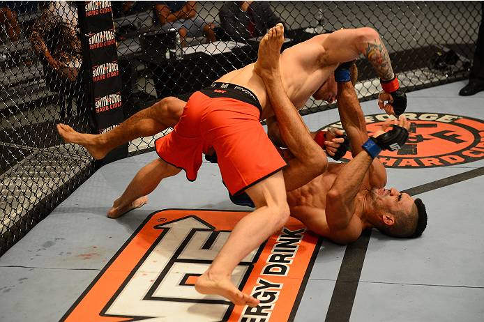 LAS VEGAS, NV - OCTOBER 16: (L-R) Joseph Stephens punches Lyman Good in their elimination fight during filming of season nineteen of The Ultimate Fighter on October 16, 2013 in Las Vegas, Nevada. (Photo by Al Powers/Zuffa LLC/Zuffa LLC via Getty Images)