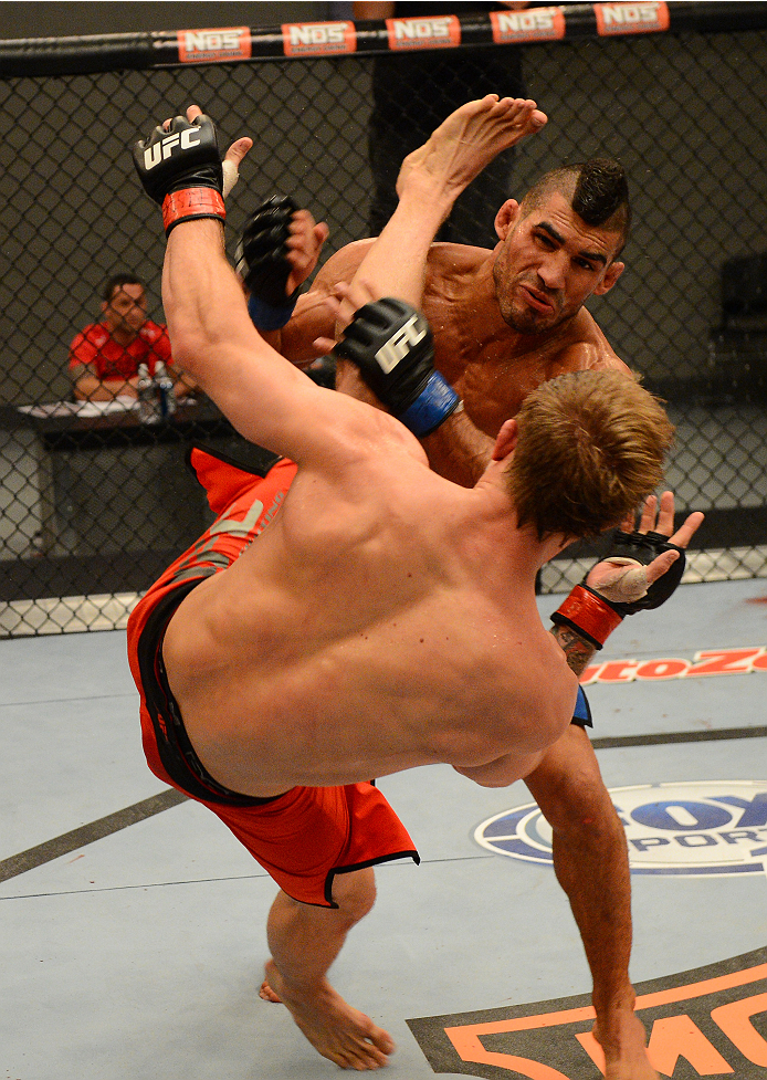 LAS VEGAS, NV - OCTOBER 16: (L-R) Lyman Good punches Joseph Stephens in their elimination fight during filming of season nineteen of The Ultimate Fighter on October 16, 2013 in Las Vegas, Nevada. (Photo by Al Powers/Zuffa LLC/Zuffa LLC via Getty Images)