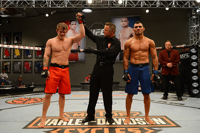 LAS VEGAS, NV - OCTOBER 16: (L-R) Joseph Stephens celebrates after defeating Lyman Good in their elimination fight during filming of season nineteen of The Ultimate Fighter on October 16, 2013 in Las Vegas, Nevada. (Photo by Al Powers/Zuffa LLC/Zuffa LLC