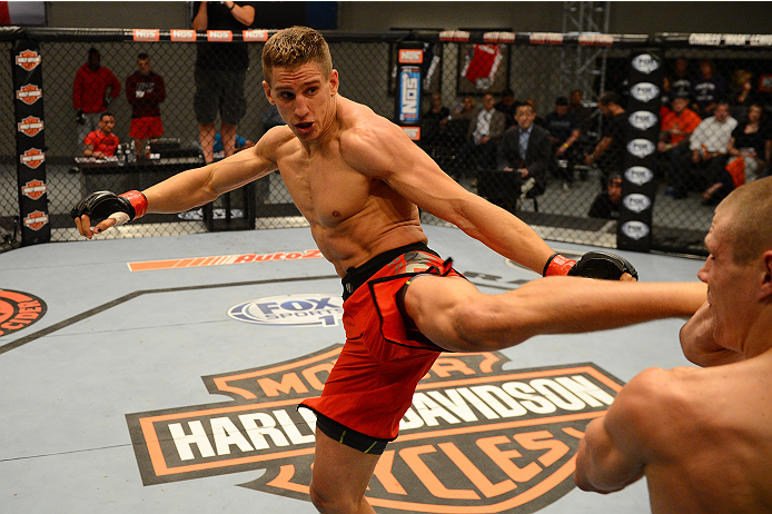 LAS VEGAS, NV - OCTOBER 16: (L-R) Bojan Velickovic kicks Tim Williams in their elimination fight during filming of season nineteen of The Ultimate Fighter on October 16, 2013 in Las Vegas, Nevada. (Photo by Al Powers/Zuffa LLC/Zuffa LLC via Getty Images)
