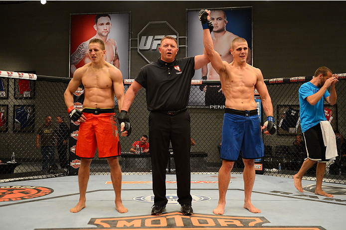 LAS VEGAS, NV - OCTOBER 16: (R-L) Tim Williams celebrates after defeating Bojan Velickovic in their elimination fight during filming of season nineteen of The Ultimate Fighter on October 16, 2013 in Las Vegas, Nevada. (Photo by Al Powers/Zuffa LLC/Zuffa