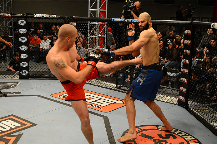 LAS VEGAS, NV - OCTOBER 16: (L-R) Daniel Spohn kicks Tyler King in their elimination fight during filming of season nineteen of The Ultimate Fighter on October 16, 2013 in Las Vegas, Nevada. (Photo by Al Powers/Zuffa LLC/Zuffa LLC via Getty Images) *** L