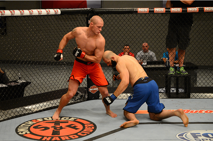 LAS VEGAS, NV - OCTOBER 16: (L-R) Daniel Spohn knocks out Tyler King in their elimination fight during filming of season nineteen of The Ultimate Fighter on October 16, 2013 in Las Vegas, Nevada. (Photo by Al Powers/Zuffa LLC/Zuffa LLC via Getty Images)