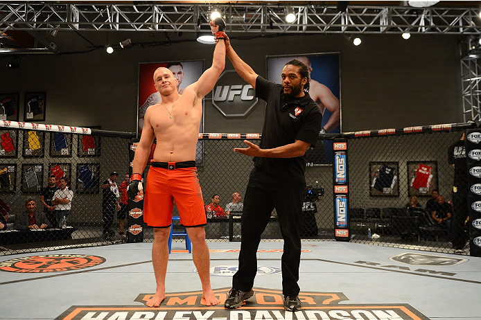 LAS VEGAS, NV - OCTOBER 16: Daniel Spohn celebrates after knocking out Tyler King in their elimination fight during filming of season nineteen of The Ultimate Fighter on October 16, 2013 in Las Vegas, Nevada. (Photo by Al Powers/Zuffa LLC/Zuffa LLC via G