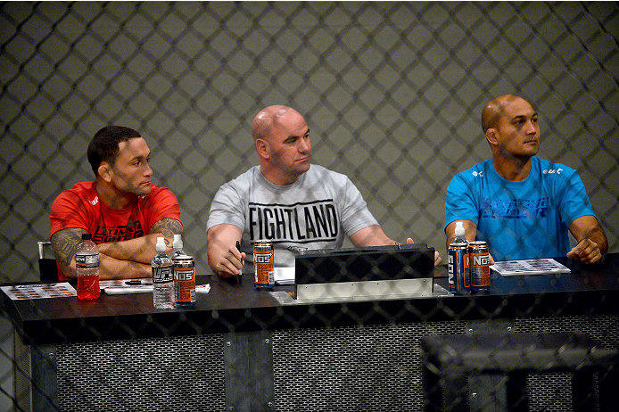 LAS VEGAS, NV - OCTOBER 16: (L-R) Coach Frankie Edgar, UFC President Dana White and coach BJ Penn watch Eddie Gordon face Matt Gabel in their elimination fight during filming of season nineteen of The Ultimate Fighter on October 16, 2013 in Las Vegas, Ne