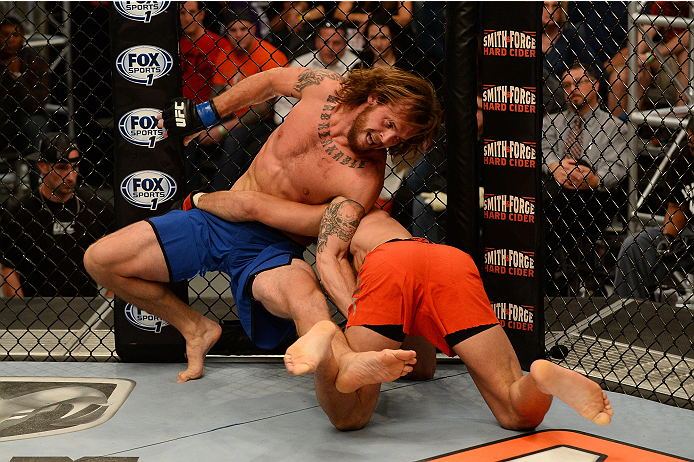 LAS VEGAS, NV - OCTOBER 16: (R-L) Nordine Taleb takes down Mike King in their elimination fight during filming of season nineteen of The Ultimate Fighter on October 16, 2013 in Las Vegas, Nevada. (Photo by Al Powers/Zuffa LLC/Zuffa LLC via Getty Images)