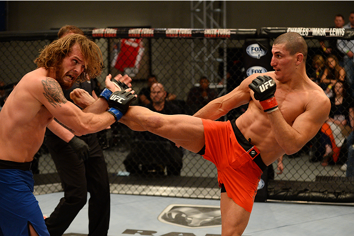 LAS VEGAS, NV - OCTOBER 16: (R-L) Nordine Taleb kicks Mike King in their elimination fight during filming of season nineteen of The Ultimate Fighter on October 16, 2013 in Las Vegas, Nevada. (Photo by Al Powers/Zuffa LLC/Zuffa LLC via Getty Images) *** L