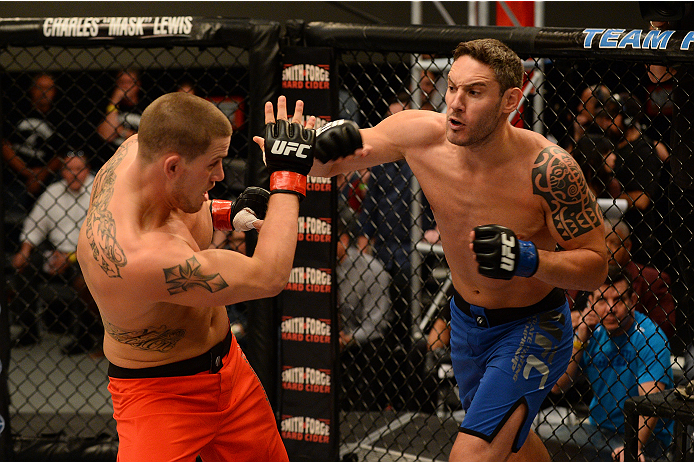 LAS VEGAS, NV - OCTOBER 16: (R-L) Chris Fields punches Josh Stansbury in their elimination fight during filming of season nineteen of The Ultimate Fighter on October 16, 2013 in Las Vegas, Nevada. (Photo by Al Powers/Zuffa LLC/Zuffa LLC via Getty Images)