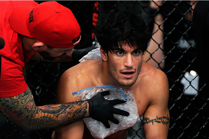 LACHUTE, CANADA - NOVEMBER 5: Team Canada fighter Elias Theodorou rests in between round during his middleweight bout against Team Australia fighter Zein Saliba during filming of The Ultimate Fighter Nations television series on November 5, 2013 in Lachu