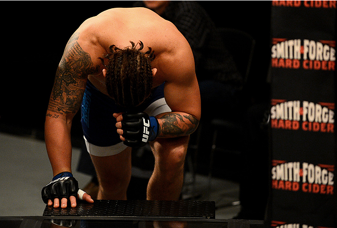 LAS VEGAS, NV - NOVEMBER 5: Team Penn fighter Josh Clark enters the Octagon before facing team Edgar fighter Corey Anderson before their preliminary fight during filming of season nineteen of The Ultimate Fighter on November 5, 2013 in Las Vegas, Nevada.