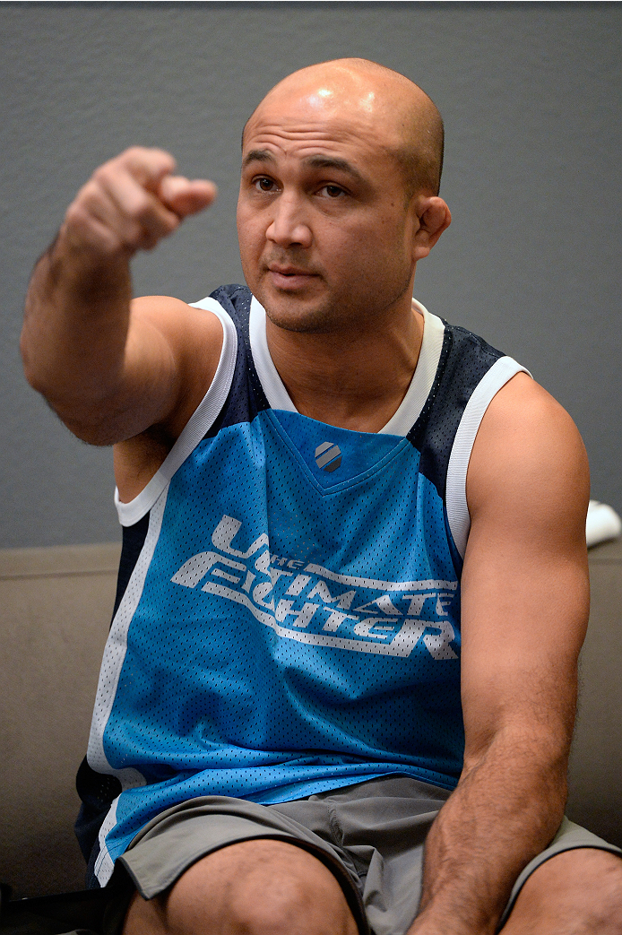 LAS VEGAS, NV - OCTOBER 24: Coach BJ Penn instructs his fighter Cathal Pendred before taking on Team Edgar fighter Hector Urbina in their preliminary fight during filming of season nineteen of The Ultimate Fighter on October 24, 2013 in Las Vegas, Nevada