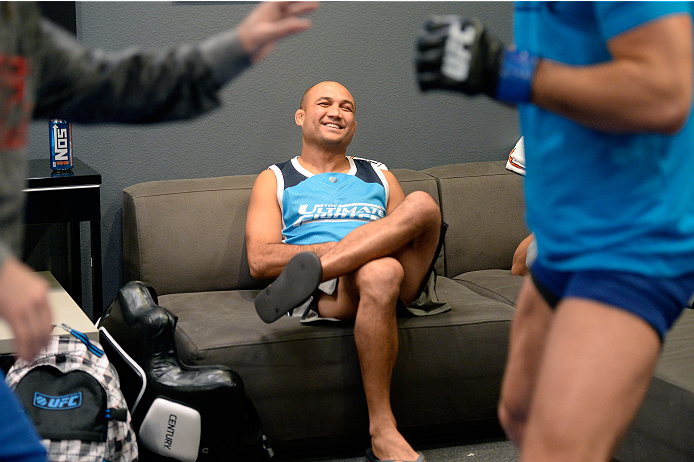 LAS VEGAS, NV - OCTOBER 24: Coach BJ Penn instructs his fighter Cathal Pendred before taking on Team Edgar fighter Hector Urbina in their preliminary fight during filming of season nineteen of The Ultimate Fighter on October 24, 2013 in Las Vegas, Nevada