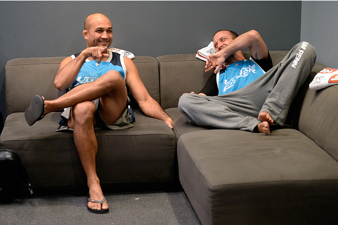 LAS VEGAS, NV - OCTOBER 24: (L-R) Coach BJ Penn and boxing coach Jason Parillo share a laugh in the locker room before fighter Cathal Pendred faces Team Edgar fighter Hector Urbina in their preliminary fight during filming of season nineteen of The Ultim