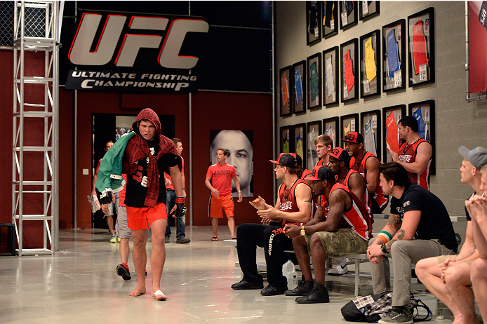 LAS VEGAS, NV - OCTOBER 24: Team Edgar fighter Hector Urbina enters the gym before facing Team Penn fighter Cathal Pendred face off in their preliminary fight during filming of season nineteen of The Ultimate Fighter on October 24, 2013 in Las Vegas, Nev
