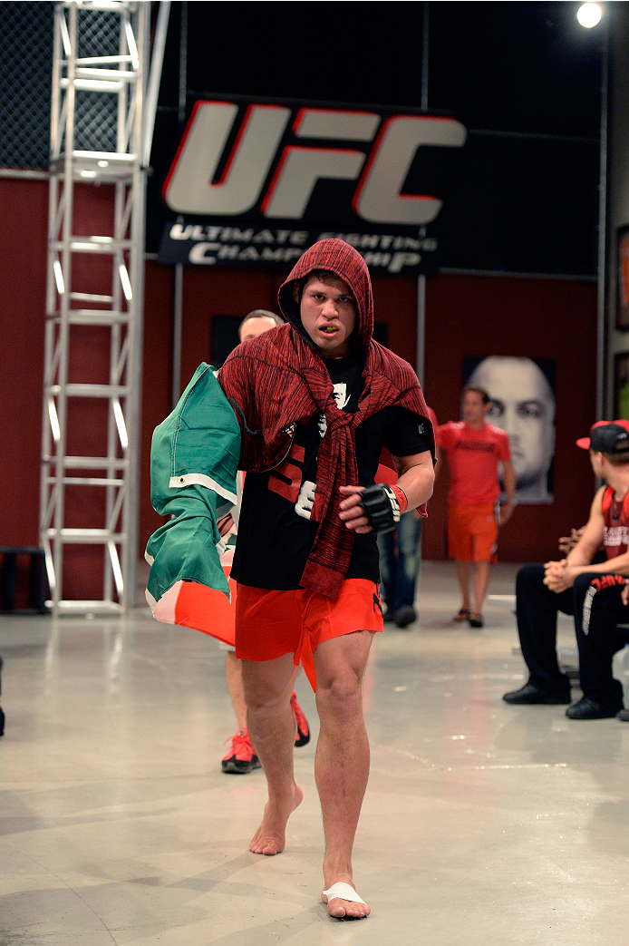 LAS VEGAS, NV - OCTOBER 24: Team Edgar fighter Hector Urbina enters the gym before facing Team Penn fighter Cathal Pendred face off in their preliminary fight during filming of season nineteen of The Ultimate Fighter on October 24, 2013 in Las Vegas, Nev