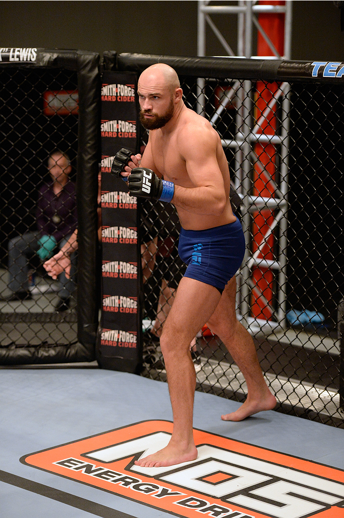 LAS VEGAS, NV - OCTOBER 24: Team Penn fighter Cathal Pendred stands in his corner before facing Team Edgar fighter Hector Urbina in their preliminary fight during filming of season nineteen of The Ultimate Fighter on October 24, 2013 in Las Vegas, Nevada