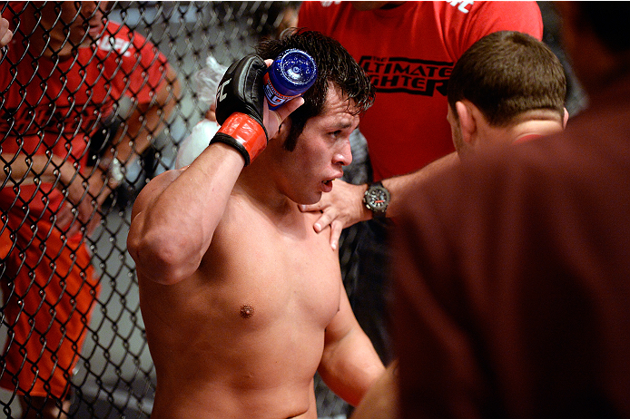 LAS VEGAS, NV - OCTOBER 24: Team Edgar fighter Hector Urbina rests between rounds against Team Penn fighter Cathal Pendred in their preliminary fight during filming of season nineteen of The Ultimate Fighter on October 24, 2013 in Las Vegas, Nevada. (Pho