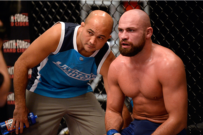 LAS VEGAS, NV - OCTOBER 24: (L-R) Coach BJ Penn discusses strategy with Team Penn fighter Cathal Pendred between rounds against Team Edgar fighter Hector Urbina in their preliminary fight during filming of season nineteen of The Ultimate Fighter on Octo