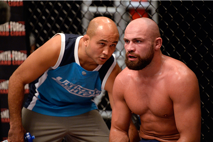 LAS VEGAS, NV - OCTOBER 24: (L-R) Coach BJ Penn discusses strategy with Team Penn fighter Cathal Pendred between rounds against Team Edgar fighter Hector Urbina in their preliminary fight during filming of season nineteen of The Ultimate Fighter on Octo