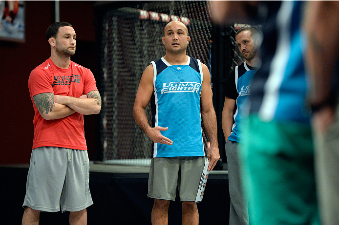 LAS VEGAS, NV - OCTOBER 24: (L-R) Coach Frankie Edgar and coach BJ Penn discuss the upcoming fight selection during filming of season nineteen of The Ultimate Fighter on October 24, 2013 in Las Vegas, Nevada. (Photo by Jeff Bottari/Zuffa LLC/Zuffa LLC vi