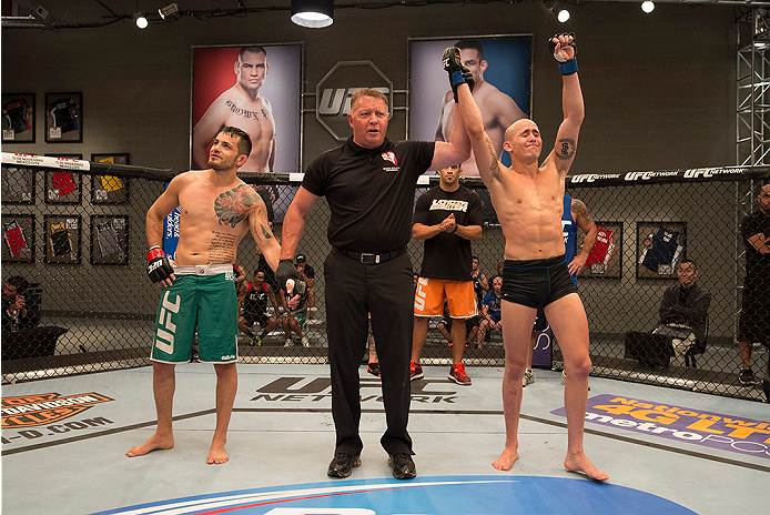 LAS VEGAS, NV - JUNE 3: (R-L) Team Werdum fighter Marlon Vera celebrates his win over team Velasquez fighter Henry Briones in their preliminary fight during filming of The Ultimate Fighter Latin America on June 3, 2014 in Las Vegas, Nevada. (Photo by Jef