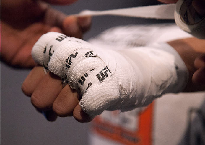 LAS VEGAS, NV - JULY 18: Team Pettis fighter Felice Herrig gets her hands wrapped before facing team Melendez fighter Heather Jo Clark during filming of season twenty of The Ultimate Fighter on July 18, 2014 in Las Vegas, Nevada. (Photo by Brandon Magnus