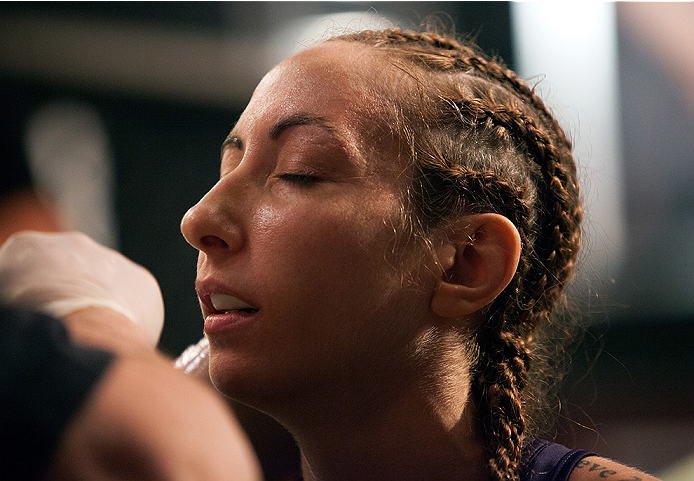 LAS VEGAS, NV - JULY 18: Team Melendez fighter Heather Jo Clark prepares to enter the Octagon before facing team Pettis fighter Felice Herrig during filming of season twenty of The Ultimate Fighter on July 18, 2014 in Las Vegas, Nevada. (Photo by Brandon