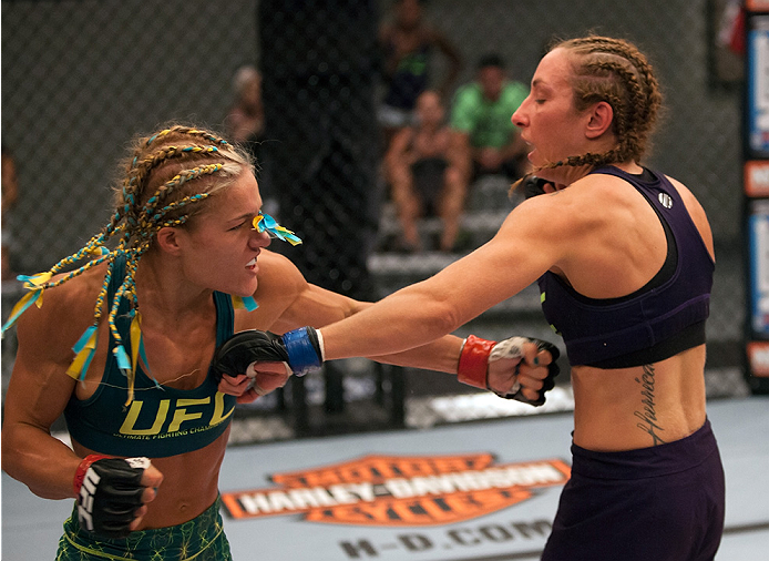 LAS VEGAS, NV - JULY 18: (L-R) Team Pettis fighter Felice Herrig punches team Melendez fighter Heather Jo Clark during filming of season twenty of The Ultimate Fighter on July 18, 2014 in Las Vegas, Nevada. (Photo by Brandon Magnus/Zuffa LLC/Zuffa LLC vi