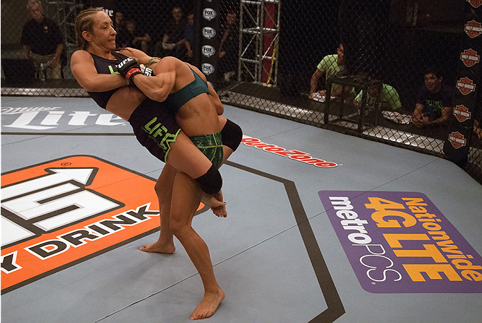 LAS VEGAS, NV - JULY 18: (L-R) Team Melendez fighter Heather Jo Clark attempts to submit team Pettis fighter Felice Herrig during filming of season twenty of The Ultimate Fighter on July 18, 2014 in Las Vegas, Nevada. (Photo by Brandon Magnus/Zuffa LLC/Z
