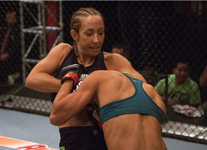 LAS VEGAS, NV - JULY 18: (L-R) Team Melendez fighter Heather Jo Clark attempts to submit team Pettis fighter Felice Herrig during filming of season twenty of The Ultimate Fighter on July 18, 2014 in Las Vegas, Nevada. (Photo by Brandon Magnus/Zuffa LLC/Z
