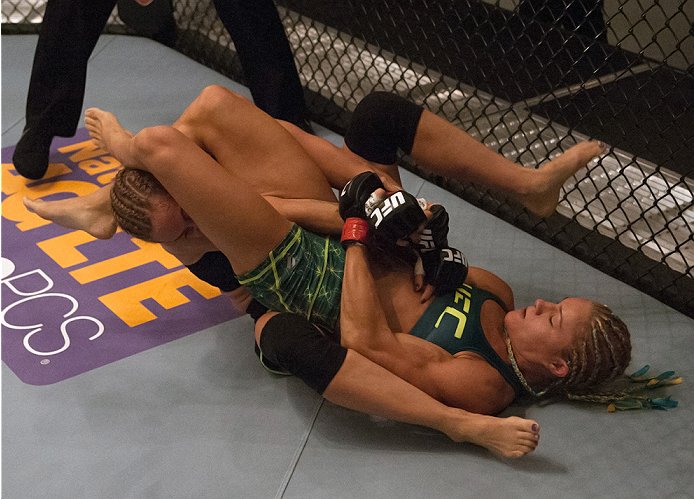 LAS VEGAS, NV - JULY 18: Team Pettis fighter Felice Herrig submits team Melendez fighter Heather Jo Clark during filming of season twenty of The Ultimate Fighter on July 18, 2014 in Las Vegas, Nevada. (Photo by Brandon Magnus/Zuffa LLC/Zuffa LLC via Gett
