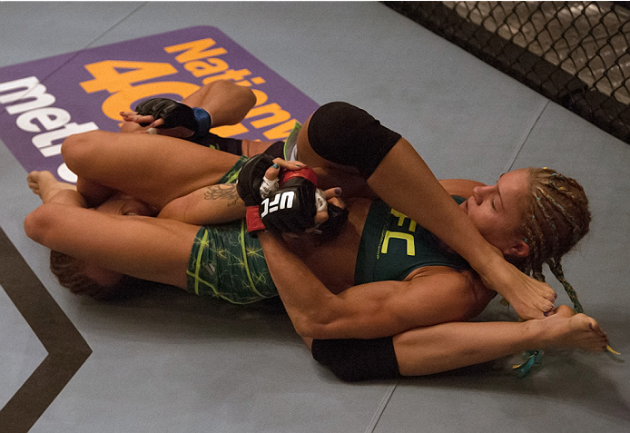 LAS VEGAS, NV - JULY 18: Team Pettis fighter Felice Herrig submits team Melendez fighter Heather Jo Clark during filming of season twenty of The Ultimate Fighter on July 18, 2014 in Las Vegas, Nevada. (Photo by Brandon Magnus/Zuffa LLC/Zuffa LLC via Gett