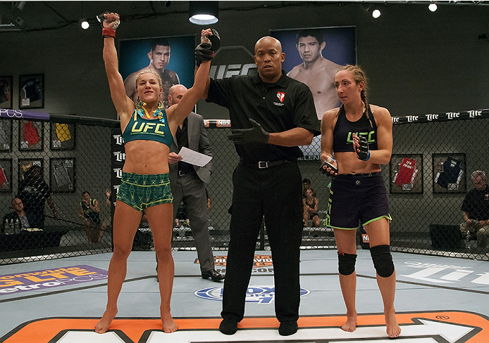 LAS VEGAS, NV - JULY 18: Team Pettis fighter Felice Herrig celebrates her submission victory over team Melendez fighter Heather Jo Clark during filming of season twenty of The Ultimate Fighter on July 18, 2014 in Las Vegas, Nevada. (Photo by Brandon Magn