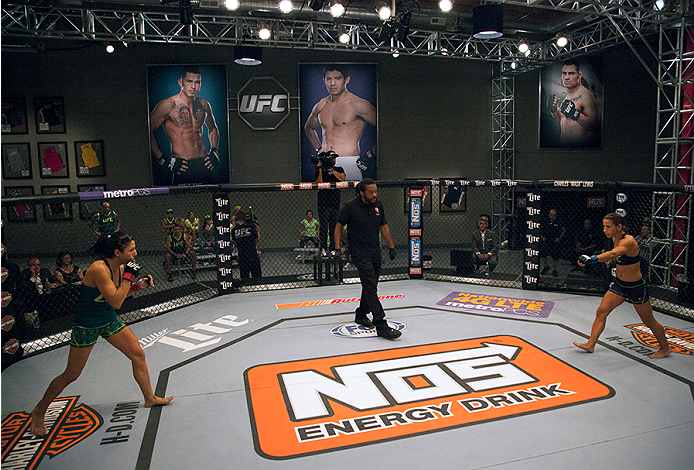 LAS VEGAS, NV - JULY 8: Team Pettis fighter Randa Markos walks towards the center of the Octagon to face team Melendez fighter Tecia Torres during filming of season twenty of The Ultimate Fighter on July 8, 2014 in Las Vegas, Nevada. (Photo by Brandon Ma
