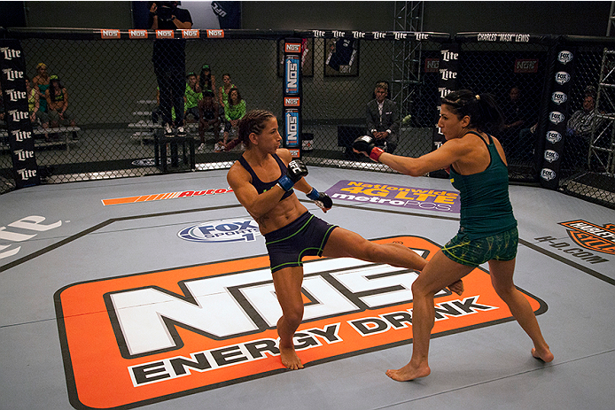 LAS VEGAS, NV - JULY 8: Team Melendez fighter Tecia Torres kicks team Pettis fighter Randa Markos during filming of season twenty of The Ultimate Fighter on July 8, 2014 in Las Vegas, Nevada. (Photo by Brandon Magnus/Zuffa LLC/Zuffa LLC via Getty Images)