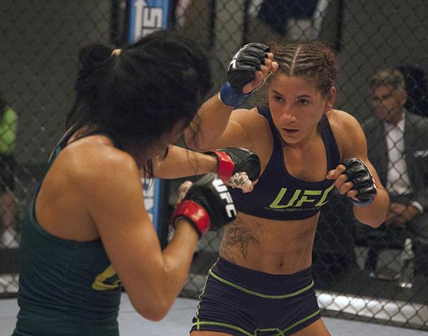 LAS VEGAS, NV - JULY 8: Team Pettis fighter Randa Markos punches team Melendez fighter Tecia Torres during filming of season twenty of The Ultimate Fighter on July 8, 2014 in Las Vegas, Nevada. (Photo by Brandon Magnus/Zuffa LLC/Zuffa LLC via Getty Image
