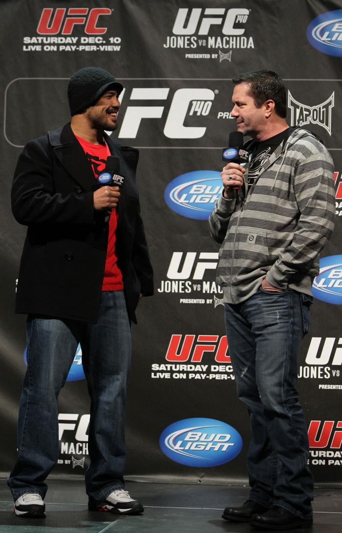 TORONTO, ON - DECEMBER 09: (L-R) UFC Middleweight contender Mark Munoz and UFC commentator Mike Goldberg interacts with fans during a Q&A session before the UFC 140 Official Weigh-in at the Air Canada Centre on December 9, 2011 in Toronto, Canada. (Phot