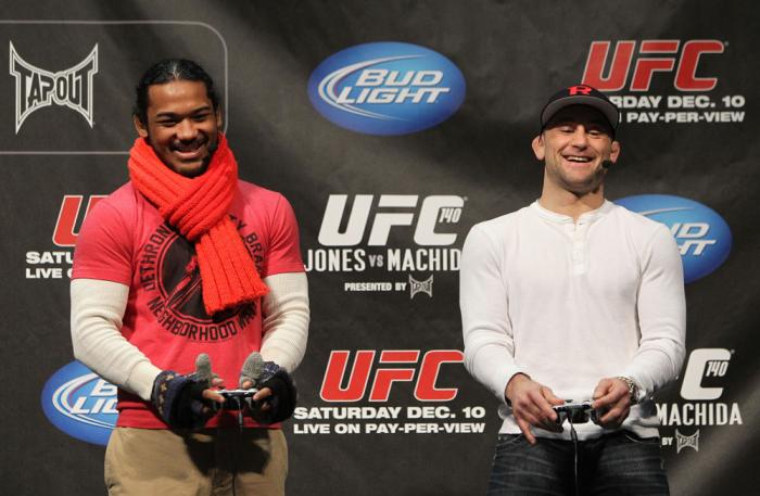 TORONTO, ON - DECEMBER 09: (R-L) UFC Lightweight Champion Frankie Edgar and challenger Benson Henderson battle each other on the UFC Undisputed 3 videogame before the UFC 140 Official Weigh-in at the Air Canada Centre on December 9, 2011 in Toronto, Cana