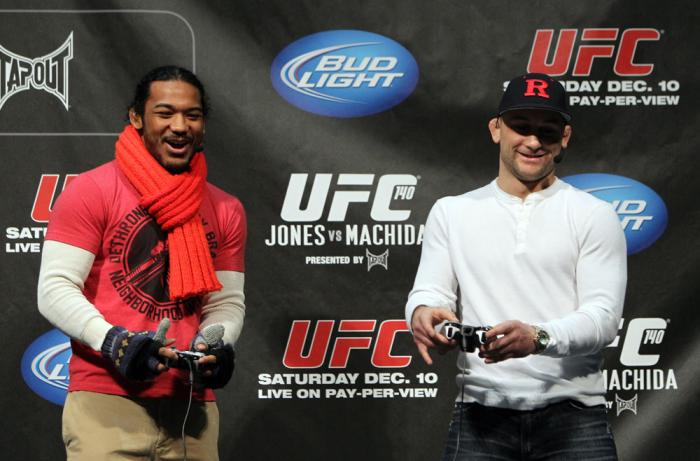 TORONTO, ON - DECEMBER 09: (R-L) UFC Lightweight Champion Frankie Edgar and challenger Benson Henderson battle each other on the UFC Undisputed 3 videogame before the UFC 140 Official Weigh-in at the Air Canada Centre on December 9, 2011 in Toronto, Cana