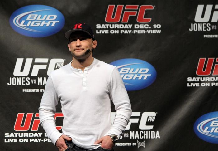 TORONTO, ON - DECEMBER 09: UFC Lightweight Champion Frankie Edgar stands on stage after defeating Benson Henderson on the UFC Undisputed 3 videogame before the UFC 140 Official Weigh-in at the Air Canada Centre on December 9, 2011 in Toronto, Canada. (P