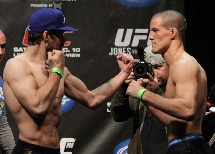 TORONTO, ON - DECEMBER 09: (L-R) Opponents Mitch Clarke and John Cholish face off after weighing in during the UFC 140 Official Weigh-in at the Air Canada Centre on December 9, 2011 in Toronto, Canada. (Photo by Josh Hedges/Zuffa LLC/Zuffa LLC via Gett