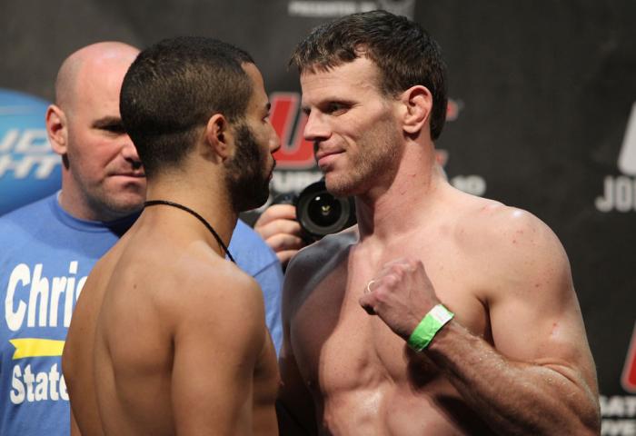 TORONTO, ON - DECEMBER 09: John Makdessi faces off with Dennis Hallman during the UFC 140 Official Weigh-in at the Air Canada Centre on December 9, 2011 in Toronto, Canada. (Photo by Josh Hedges/Zuffa LLC/Zuffa LLC via Getty Images)